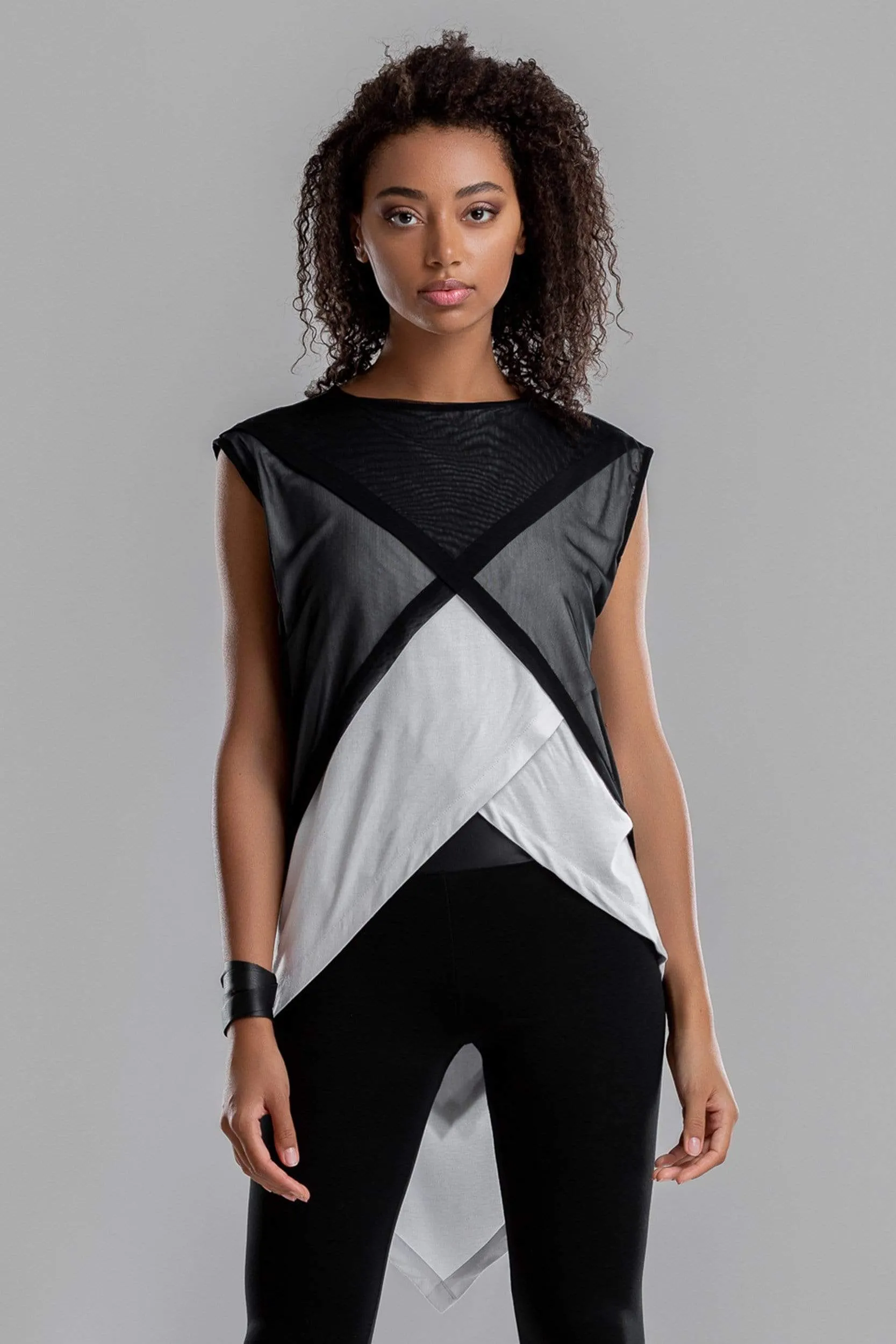 Asymmetrical white shirt with black mesh top