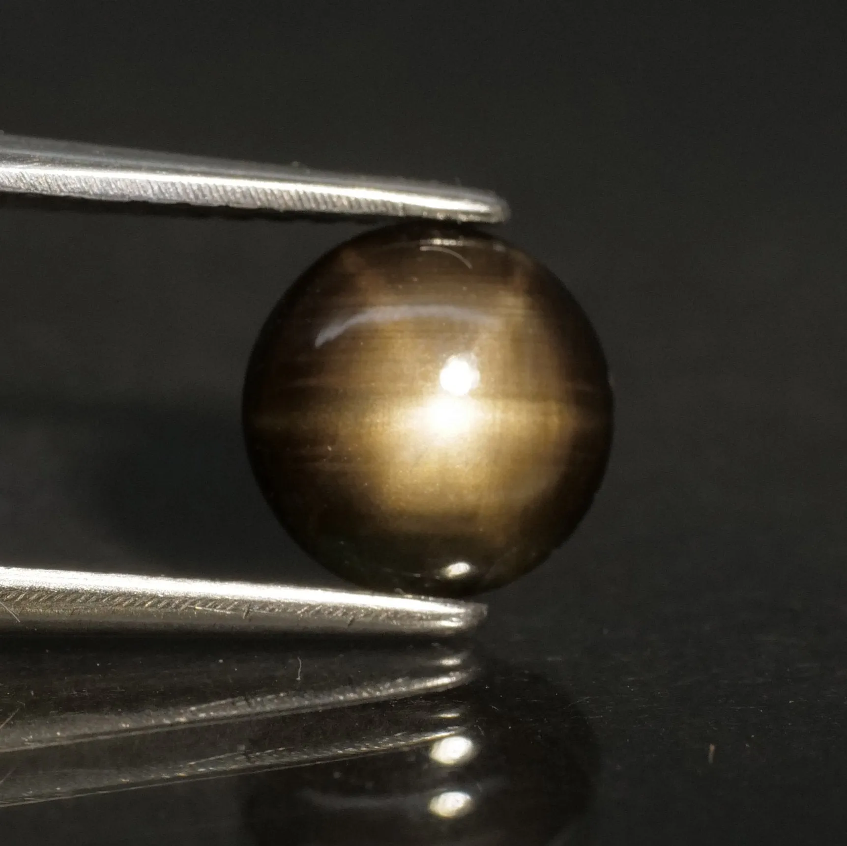 Sapphire | black, star effect, round cut 7mm, 1.30 ct