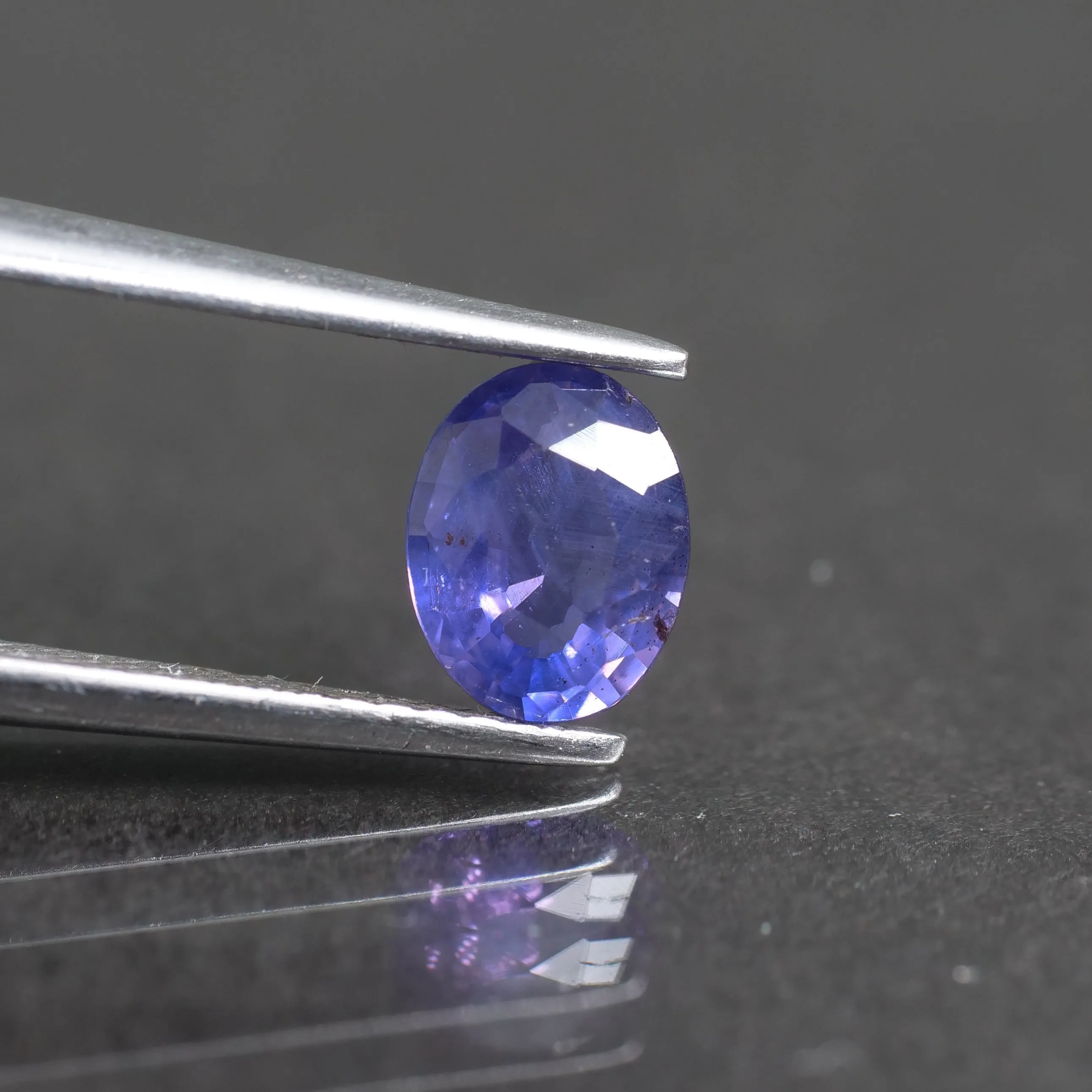 Sapphire | natural, purple, oval cut 6.5x5 mm, SI, 0.8 ct