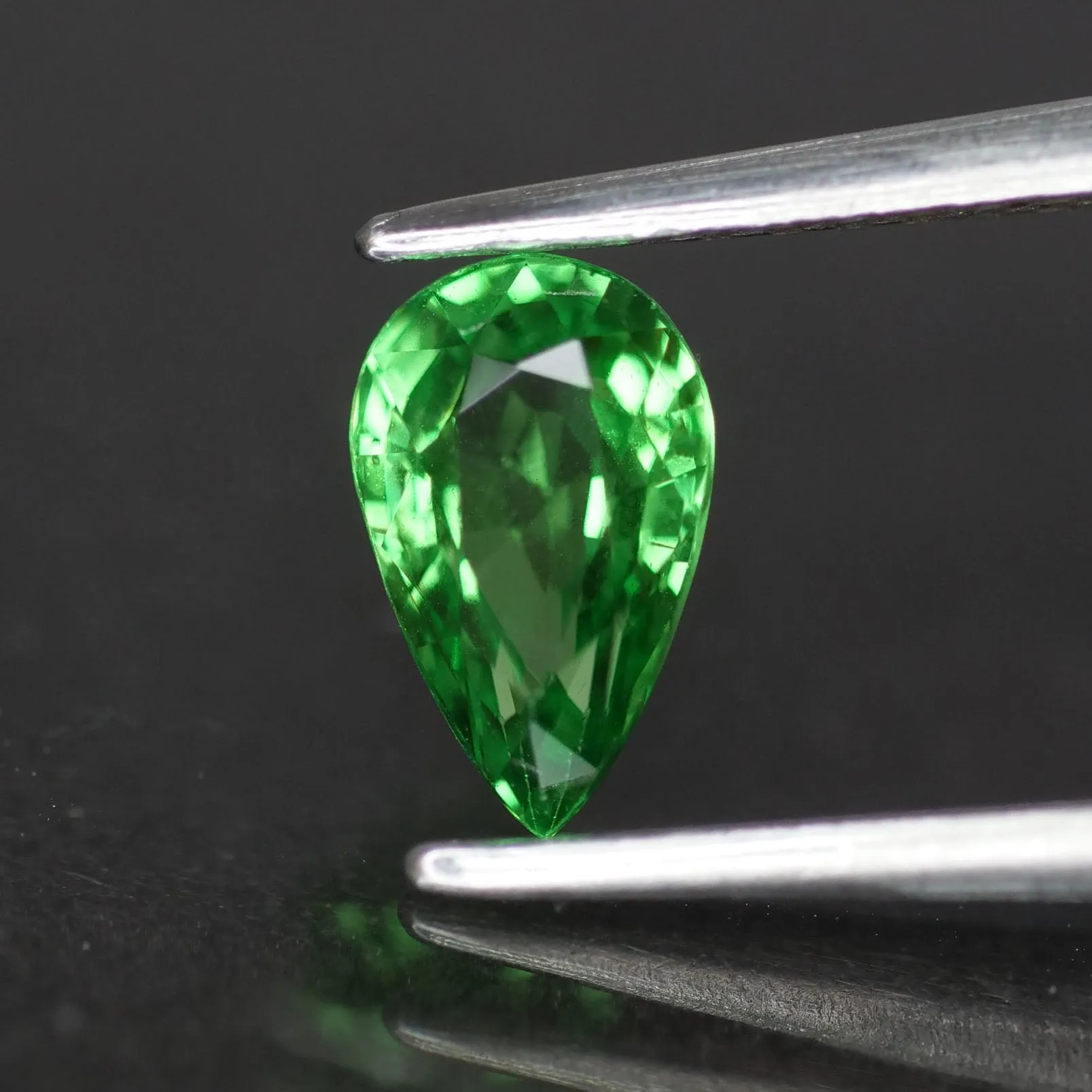 Tsavorite Garnet | natural, shocking green, pear cut 7x4.3 mm, VS 0.75ct