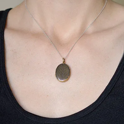 Victorian 15kt Black Striped Enameled Locket